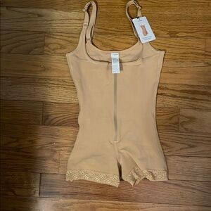 Cream Shapewear Bodysuit with Form-Fitting Design
